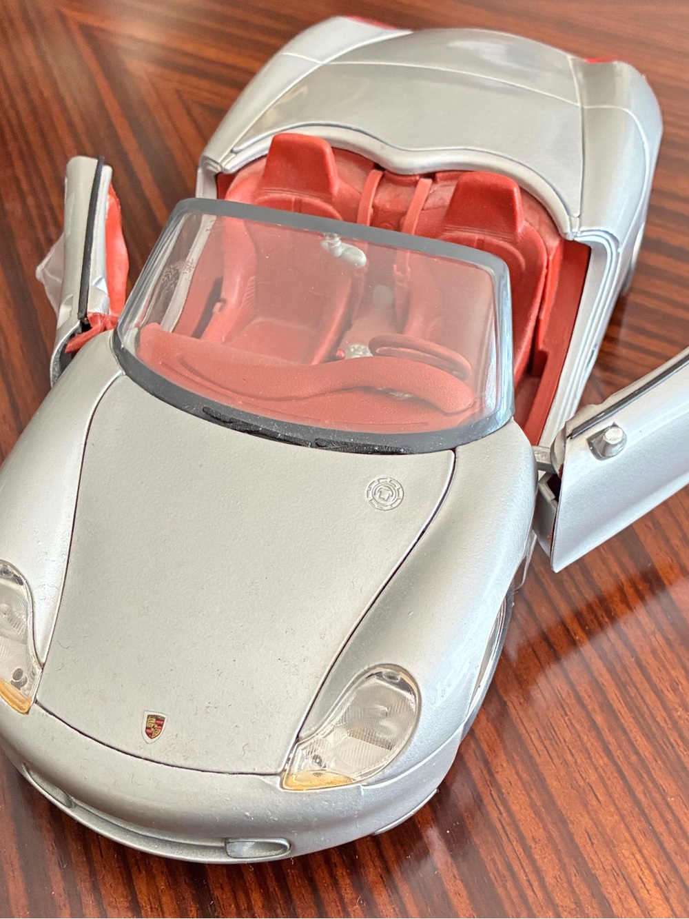 Silver Porsche Convertible Diecast Car with Red Interior